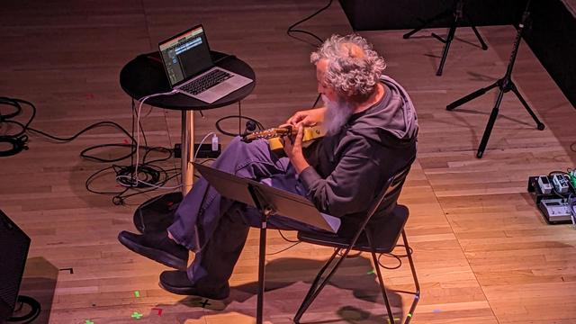 Bill Orcutt with guitar plus laptop