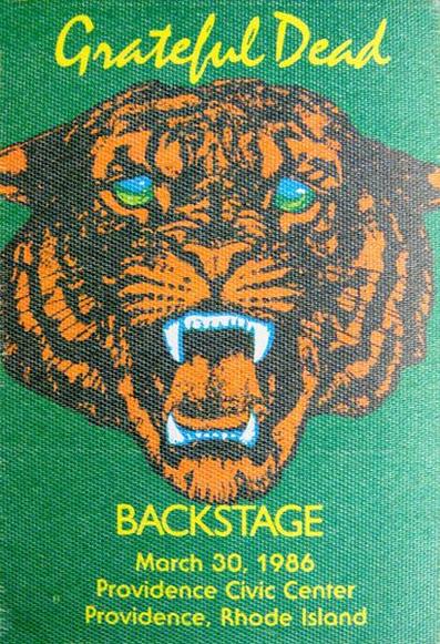Grateful Dead backstage pass on green background with roaring tiger