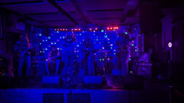 Prison, a 7 piece band, jam onstage