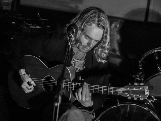 Doug Shaw plays guitar