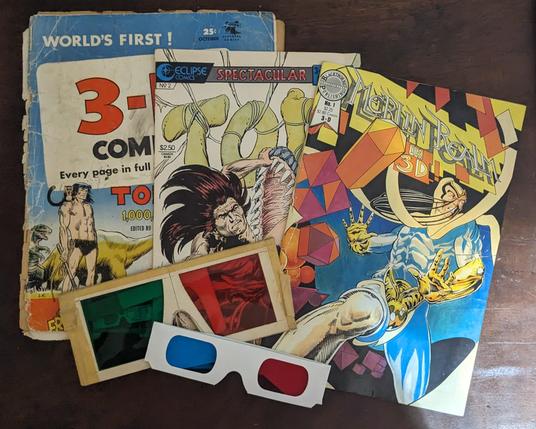 a set of 3 3D comics plus glasses