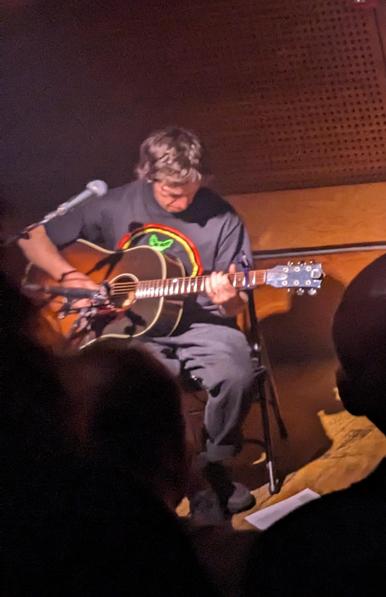 Andrew Broder plays guitar 