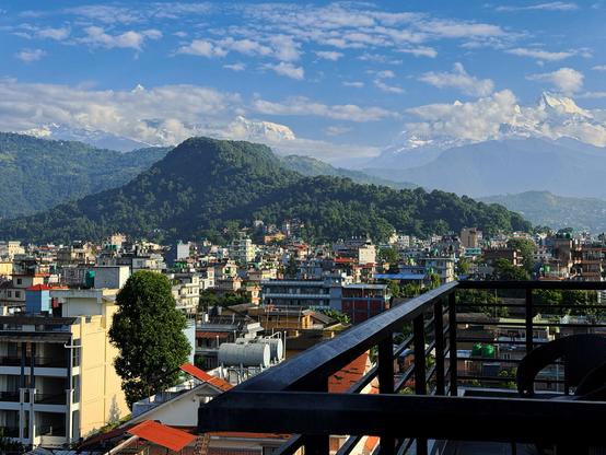 A photo of the Annapurna range from Pokhara with the snowy peaks of various Annapurna peaks including Mt Fishtail (local name Macchapuchhre) peeking out