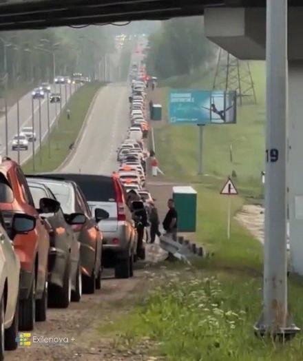 A very long fuel line to the Rosneft gas station on Shiryamov Street in Irkutsk, Irkutsk Oblast, Russia, where portable toilets have been installed.