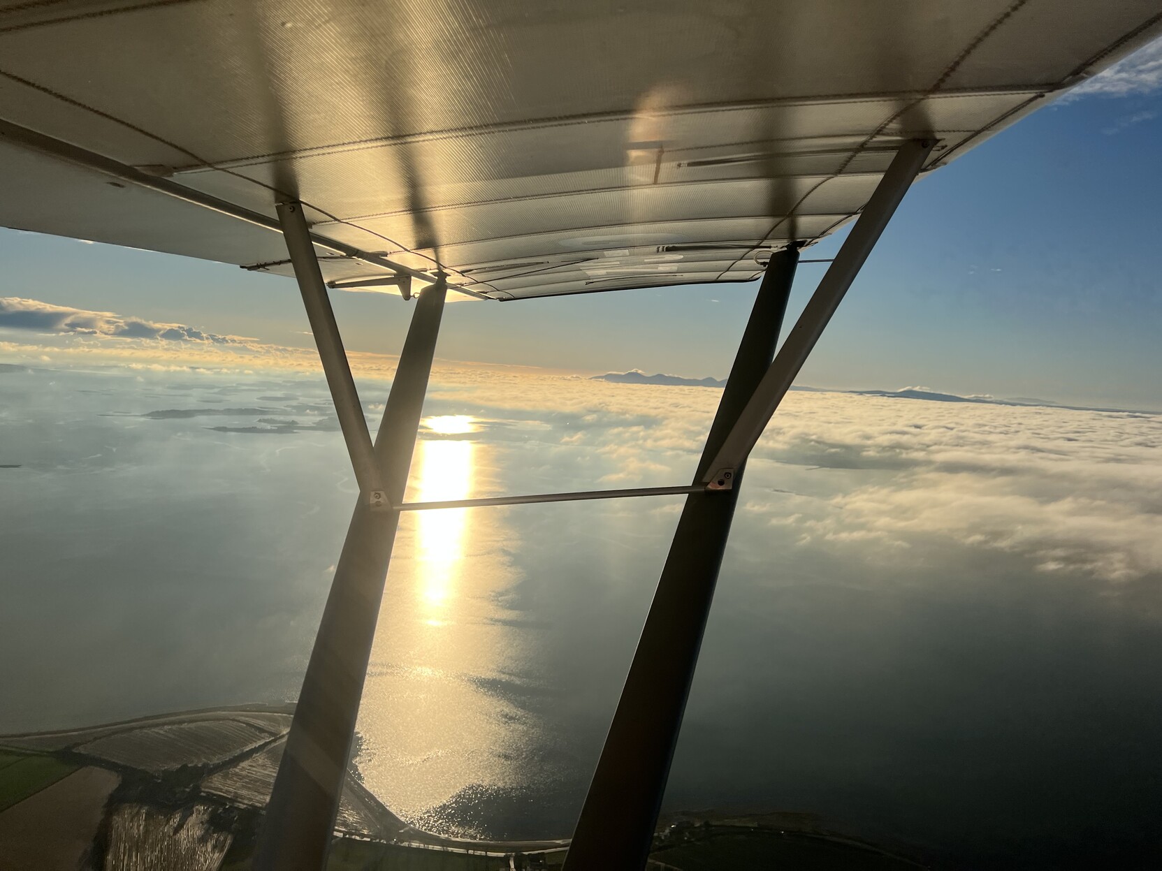 The clouds seen from above in a little airplane