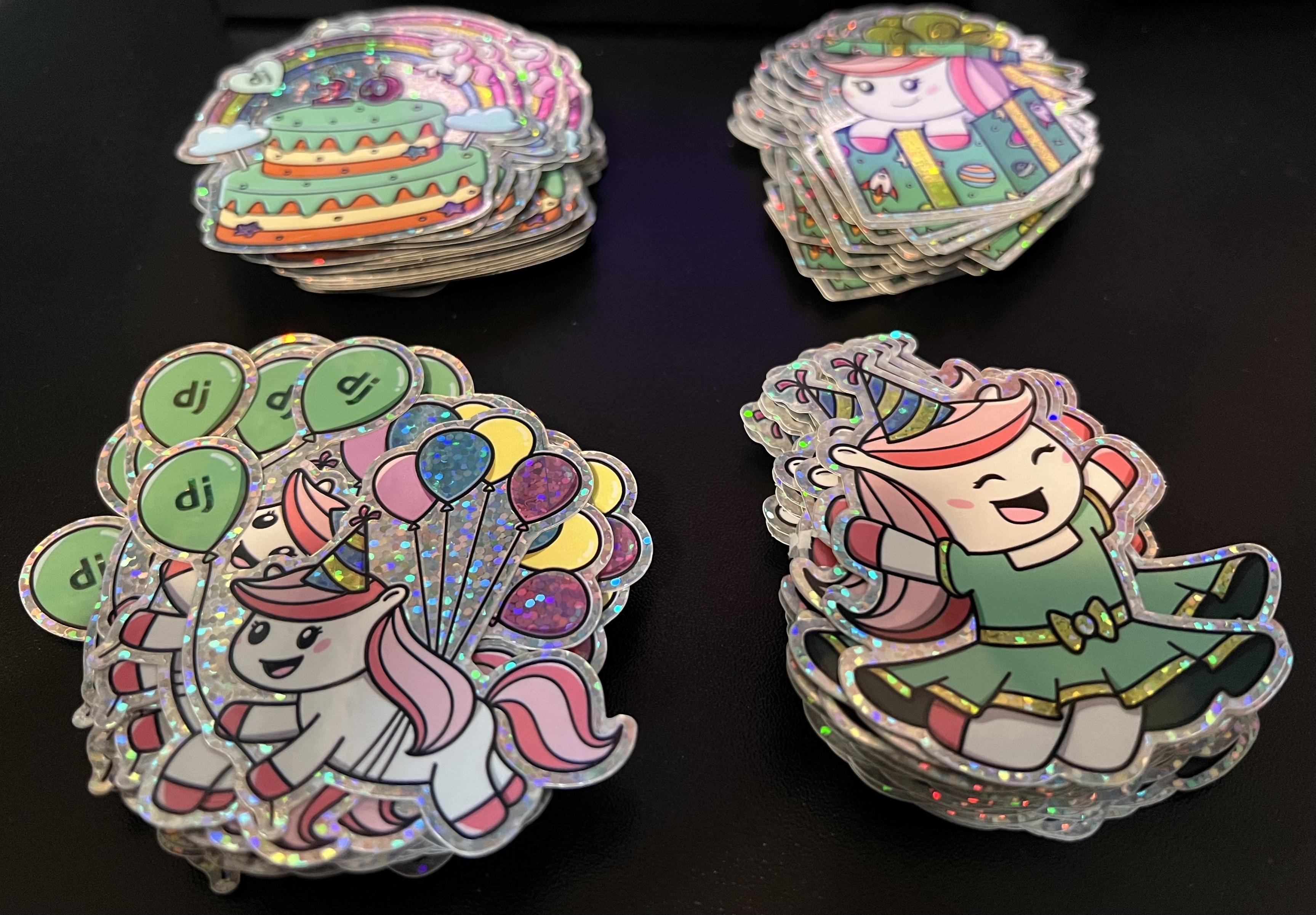 4 piles of Django pony stickers.