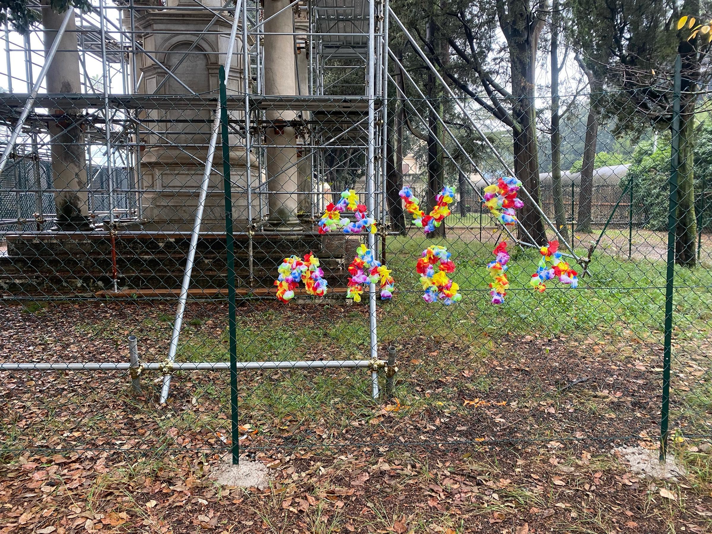 Ave Maria, seen on a fence in the local park. Behind the fence is a monument to war dead.  I don’t really get it.