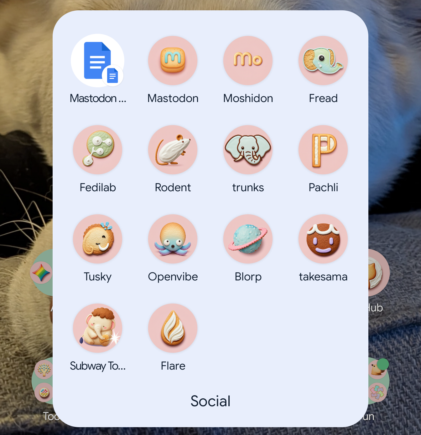 Mobile app folder titled "Social" with icons designed as decorated cookies.
