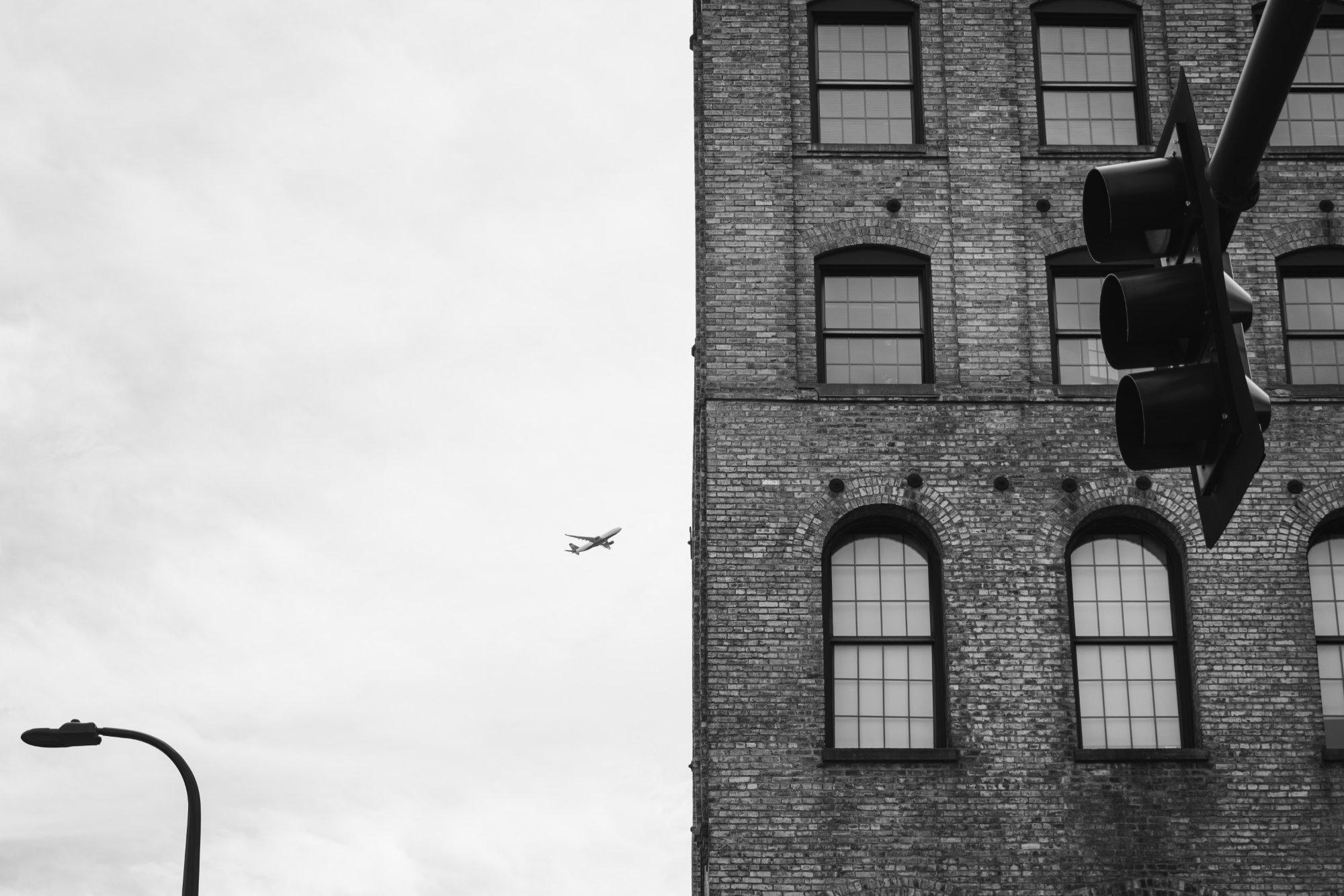 Delta A330 flying over the North Loop neighborhood in Minneapolis