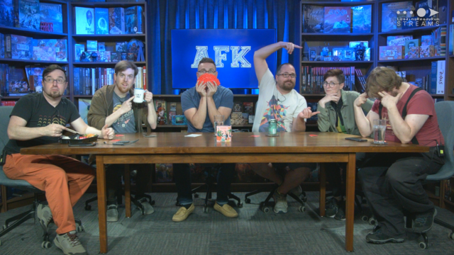 The AFK crew sitting around the table