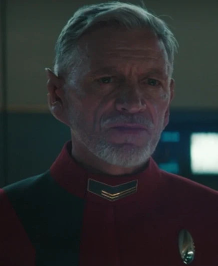 Commander Rayner as portrayed by Callum Keith Rennie.

He is a white Kellerun male. He has grey hair and somewhat pointed ears.