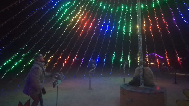 a cone of LEDs, like some Christmas trees, but large enough to walk inside. different controls inside affect the patterns on the LEDs