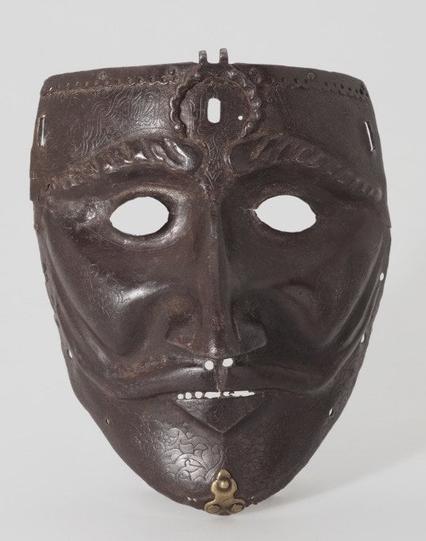 War mask (iron, steel, and brass) from Türkiye or western Iran, made by an unknown craftsman between 1450 and 1500. 20 cm (7.8 in) high. Now in the Khalili Collections, United Kingdom. Photo credit: Khalili Collections. [540x686]