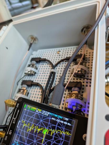 Checking the SWR from a name brand Alfa 915Mhz antenna. It reads 1.069, which is very good