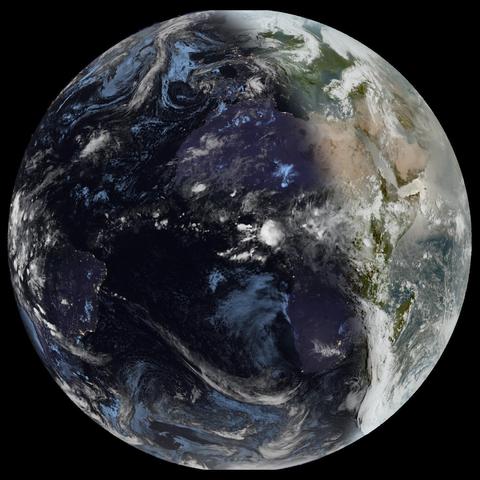 Full disk satellite view of Earth centered on Africa and Europe, with partial views of South America and the Middle East. The satellite image showing Earth from geostationary orbit, captured by EUMETSAT's Meteosat Third Generation (MTG) satellite using the GeoColor RGB composite technique. The image displays both day and night views of Earth, with the daytime portion showing true color representation of land and clouds, while the nighttime portion appears darker with visible city lights. White cloud formations are scattered across the image, particularly along the intertropical convergence zone. The image provides a full disk view of Earth, showing the planet's curvature against a black background.
