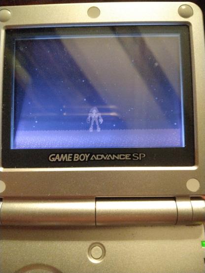 Photo of a GBA SP with end screen from Metroid.