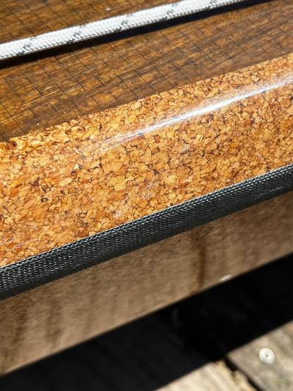 Close-up of a kayak showing that it is made of cork.