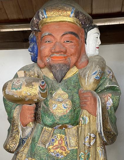 3-faced Daikokuten, an example of syncretic folk religion explained in the slideshow.