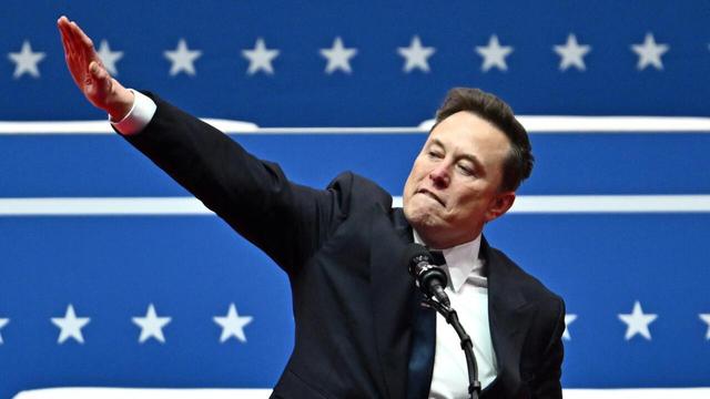 Musk tossing Nazi salute.
