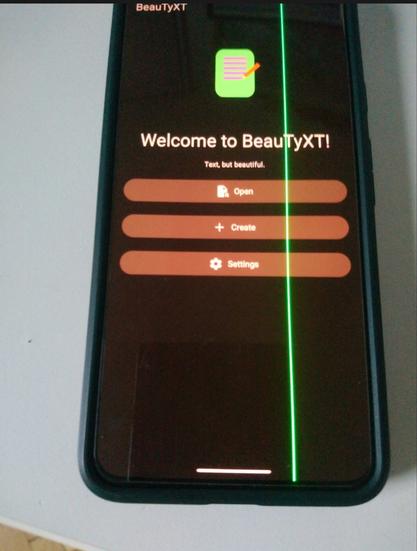a google pixel 8 phone with a vertical green line across the display