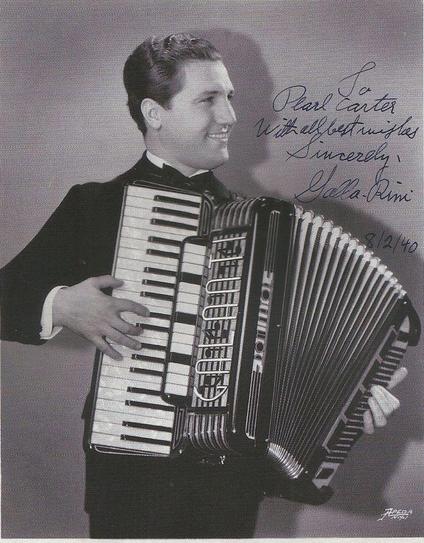 Signed promo photo of an adult Gala-Rini at a handsome age 30 or younger. Very virile with his smiling face and Italian piano accordion.