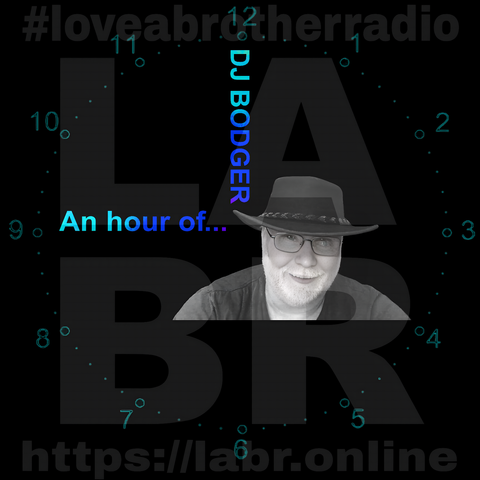 Black Background. LABR Logo in deep dark grey. #lloveabrotherradio on top. https://labr.online on the bottom. A army green colored clock with numbers and dots covering the entire image. The hand set at 9 o'clock is the short hand and the hand is made out of the name of the show. "And hour of..." The min. hand set at the 12 and is made out of his name. DJ Bodger. A black & white picture of DJ Bodger. White British male with glasses, wearing an Aussie. cowboy hat. Grey manicured beard. Black t-shirt