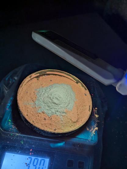 I shouldn't have added the regular warm white atop the warm white I got from mixing red and green in a 2:1 ratio. Oh well. A glowing pile of yellowy white powder atop an orangey powder weighing 39 grams