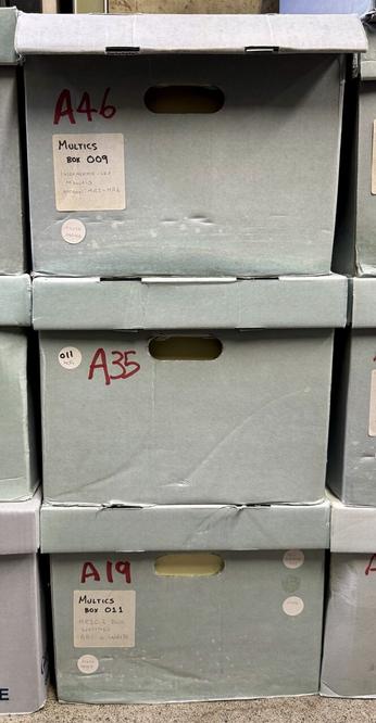a stack of bankers boxes containing the MIT Multics archive
