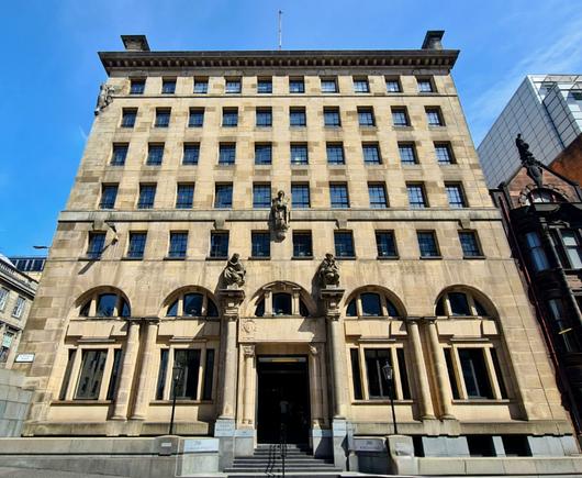 A simplified modern classical style 1920s Glaswegian financial building.
