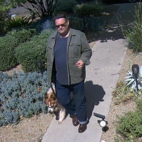 Kyle walking with Bonnie the Dingo Dog