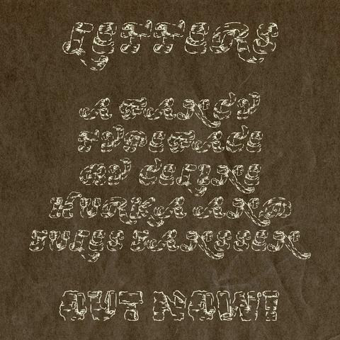 A heavily ornate typeface and almost unreadable typeface which looks like torn paper on a paper textured background, spelling out the words "Letters, a fancy typeface by Céline Hurka and Jules Janssen, out now!"
