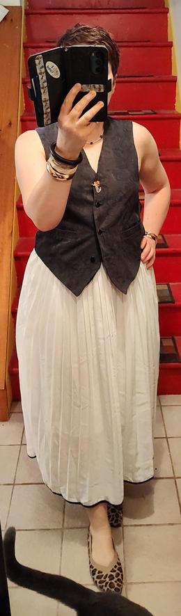 Billowy white skirt with black edging, black vest with a mermaid pin to make it decent lol. Greek island eyeball necklace works with this one. Bangle bracelets, leopard print flats. Oscar makes everything more chic! 😺