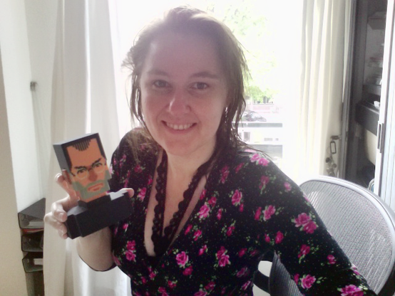 Photo of a woman holding a 3D print of my Steve Jobs bust design.