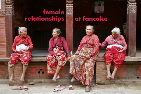 Photograph with added text: Female Relationships, at Fancake. Four old Nepalese women sit together on a low brick wall, their feet dangling, most of them barefoot, their shoes kicked off below them. They're dressed in loose patterned fabrics in various shades of red and the mood is relaxed.