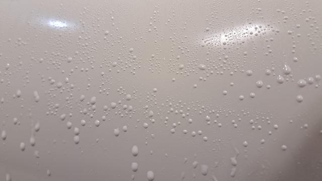 Here is another indicator of buffing progress: water beading on the surface when it's sufficiently buffed.