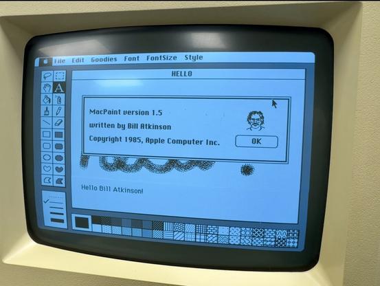 A screenshot of the MacPaint about which features a graphic of bill atkinson
