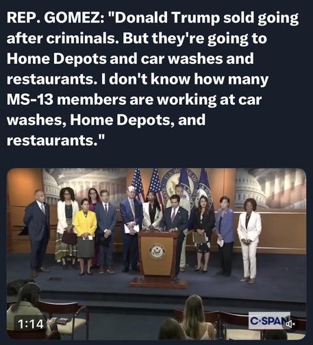 A press conference featuring Representative Gomez speaking about Donald Trump and crime. Several other officials stand behind him, with U.S. flags and a capitol backdrop visible. The speaker discusses concerns regarding MS-13 members in various jobs.