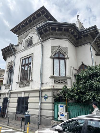 Attractive 19th century house with intricately decorated eaves.