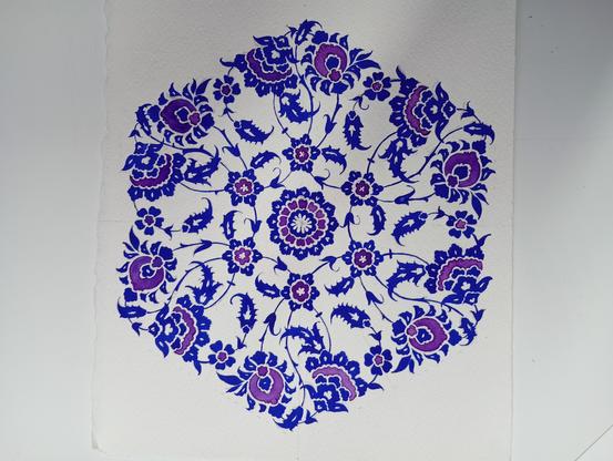 A hexagonal biomorphic design with swirling stems, leaves, and flours in ultramarine blue, with details picked out in purple. Everything follows six-fold radial symmetry.