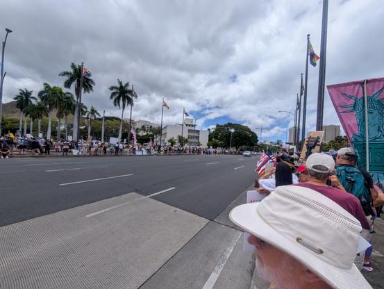 Honolulu Hawaii street with protesters, just after noon