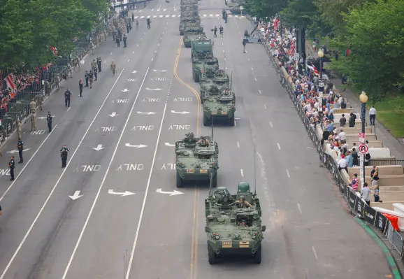 Armoured vehicles take part in a military parade in Washington, DC [Brian Snyder/Reuters]