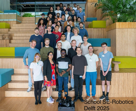 Group picture of PhD students and organizers of the summer school in Delft 2025