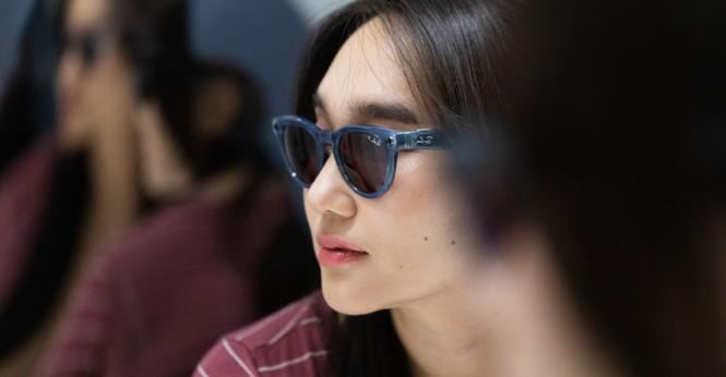 Person wearing Ray-Ban Meta Smart Glasses in front of a mirror creating an uneasy infinity effect