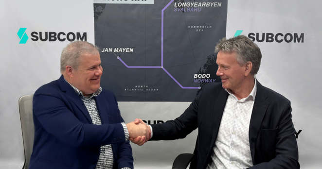(From left) David Coughlan, CEO of SubCom, and Morten Tengs, CEO of Space Norway, sign the contract for the Arctic Way Cable System.