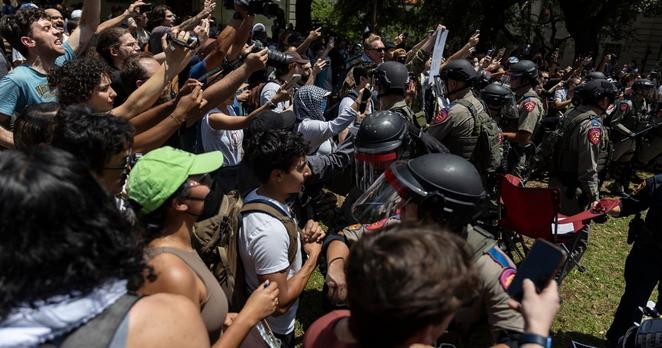 Texas Department of Public Safety troopers surround a pro-Palestinian encampment on the University of Texas at Austin campus on April 29, 2024.
