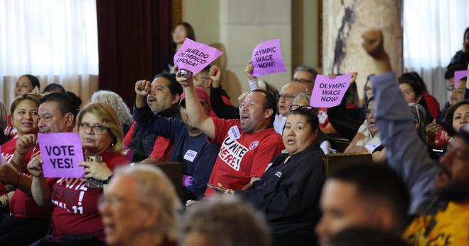 LOS ANGELES, CALIF. MAY 14, 2025 - Ahead of Wednesday's City Council vote on a proposal to boost the city's minimum wage for hotel and airport workers to a nation's-high $30 an hour by 2028, airport,hotel and tourism workers rallied inside and outside City Hall in support of the measure on Wednesday, May 14, 2025. (Allen J. Schaben / Los Angeles Times)