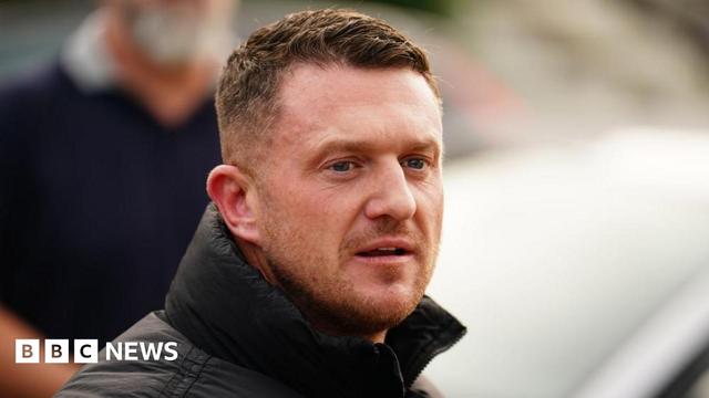 Headshot of Stephen Yaxley-Lennon in a black coat