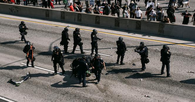 In downtown Los Angeles on Sunday, protesters faced off with law enforcement officers. Disinformation about the events has circulated online.