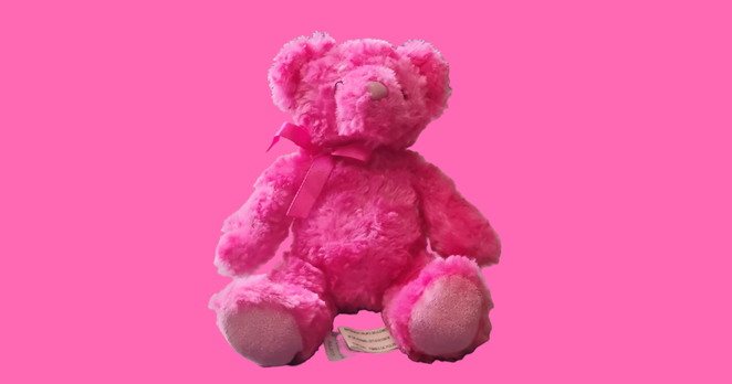 pink small teddy bear plushie named Pona atop a hot pink background. she's our mascot!