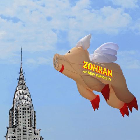 An inflatable pig balloon against a blue sky, bearing the Zohran for Mayor logo. The Chrysler Building sits to one side.

Image:
Frank Vincentz (modified)
https://commons.m.wikimedia.org/wiki/File:Geeste_-_Biener_Stra%C3%9Fe_-_Speicherbecken_-_Drachenfest_38_ies.jpg

Petri Krohn
https://commons.m.wikimedia.org/wiki/File:Chrysler_building-_top.jpg

CC BY-SA 3.0
https://creativecommons.org/licenses/by-sa/3.0/deed.en
